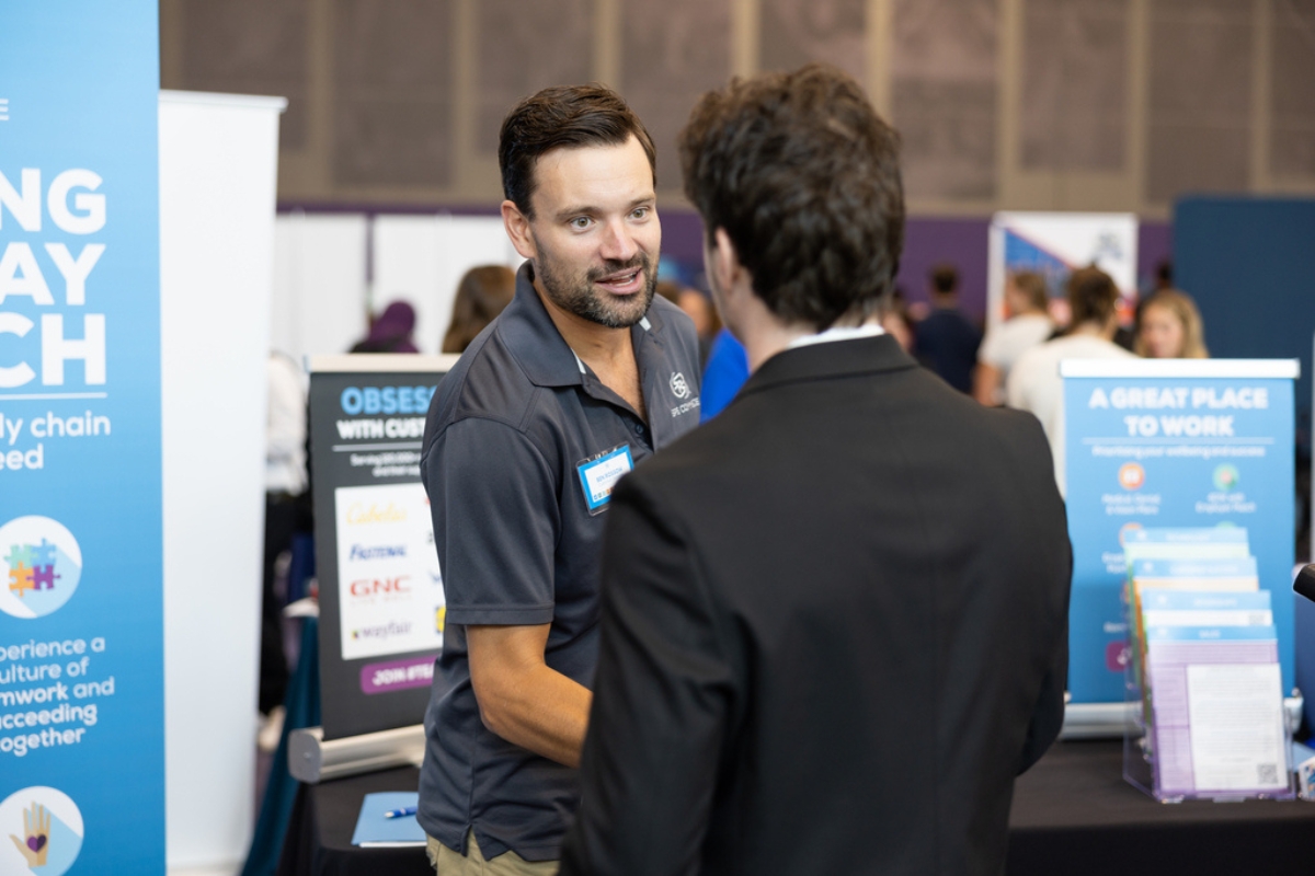a company meets engineers at a career fair