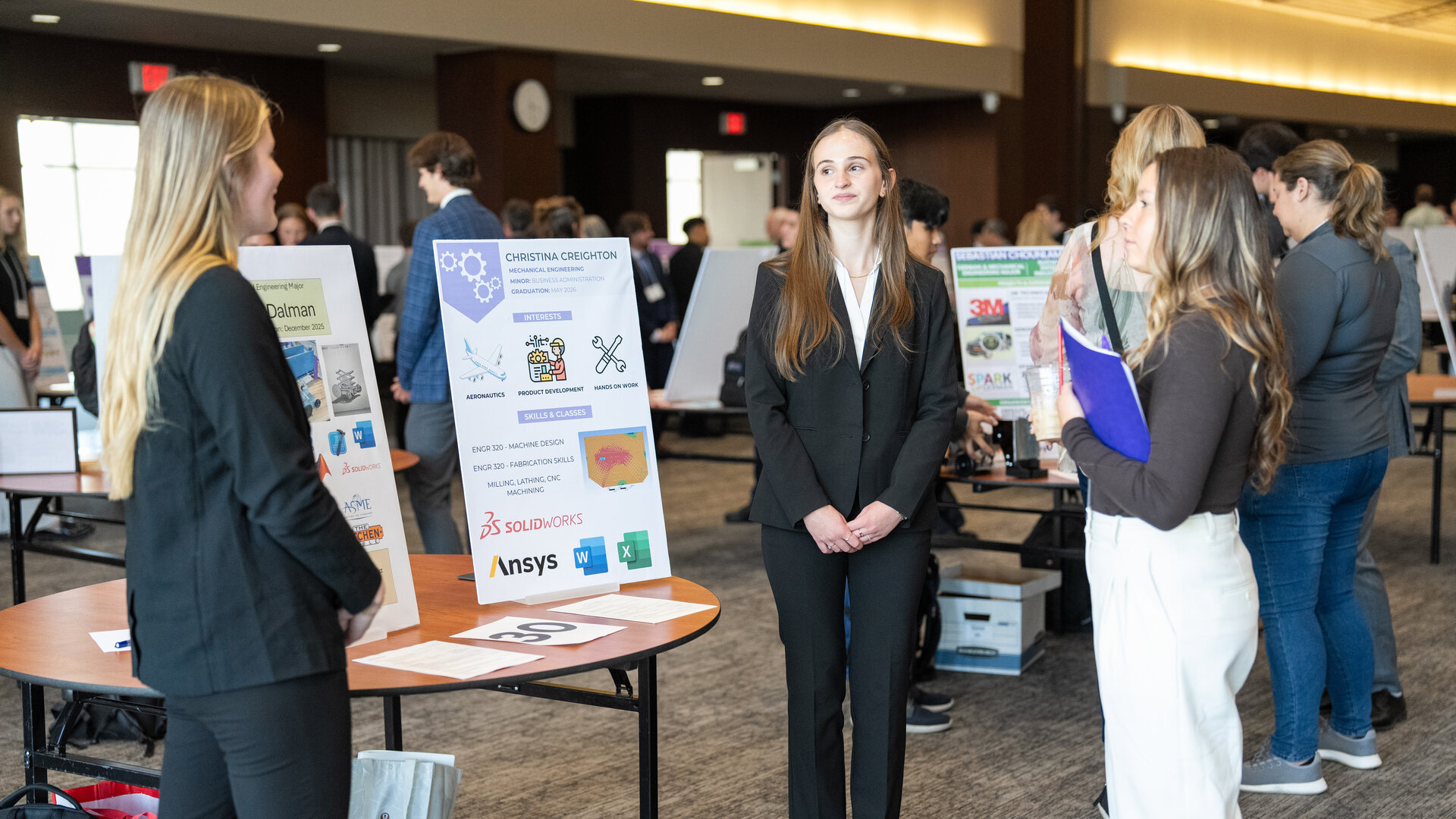 Engineering students speak with employers.