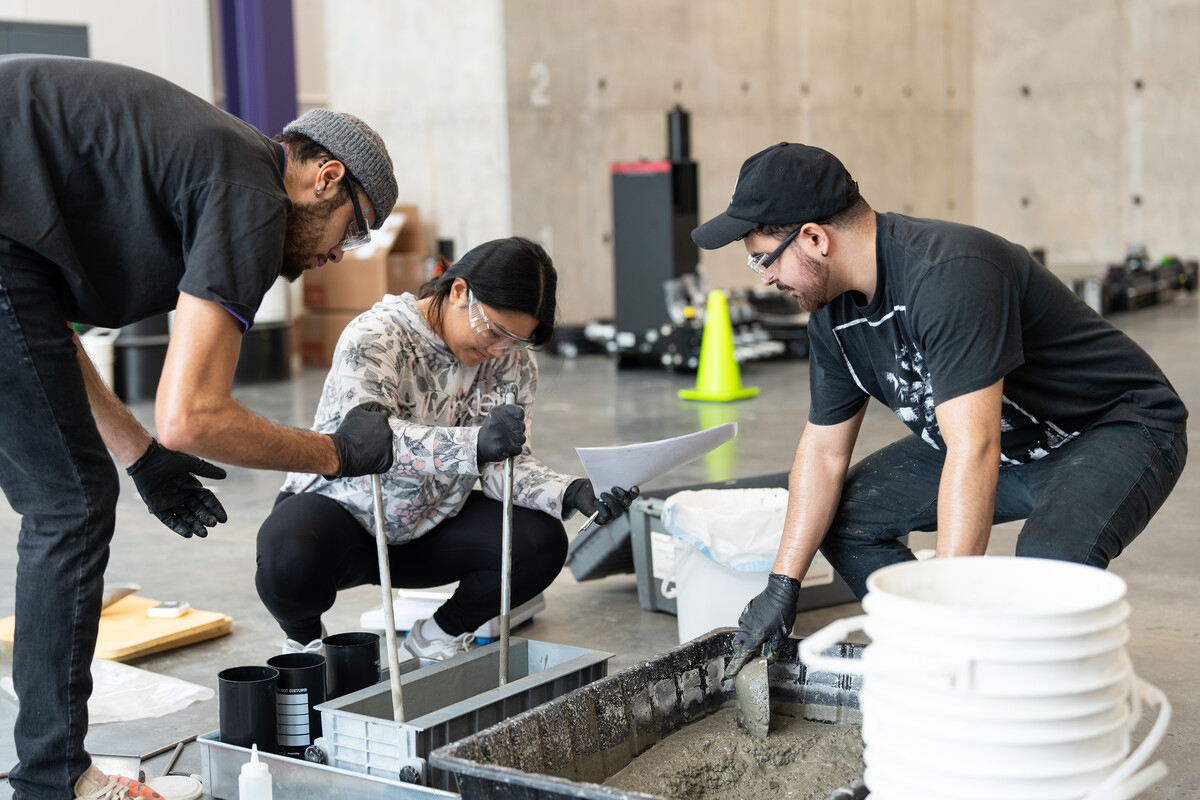 St. Thomas engineering students test concrete.