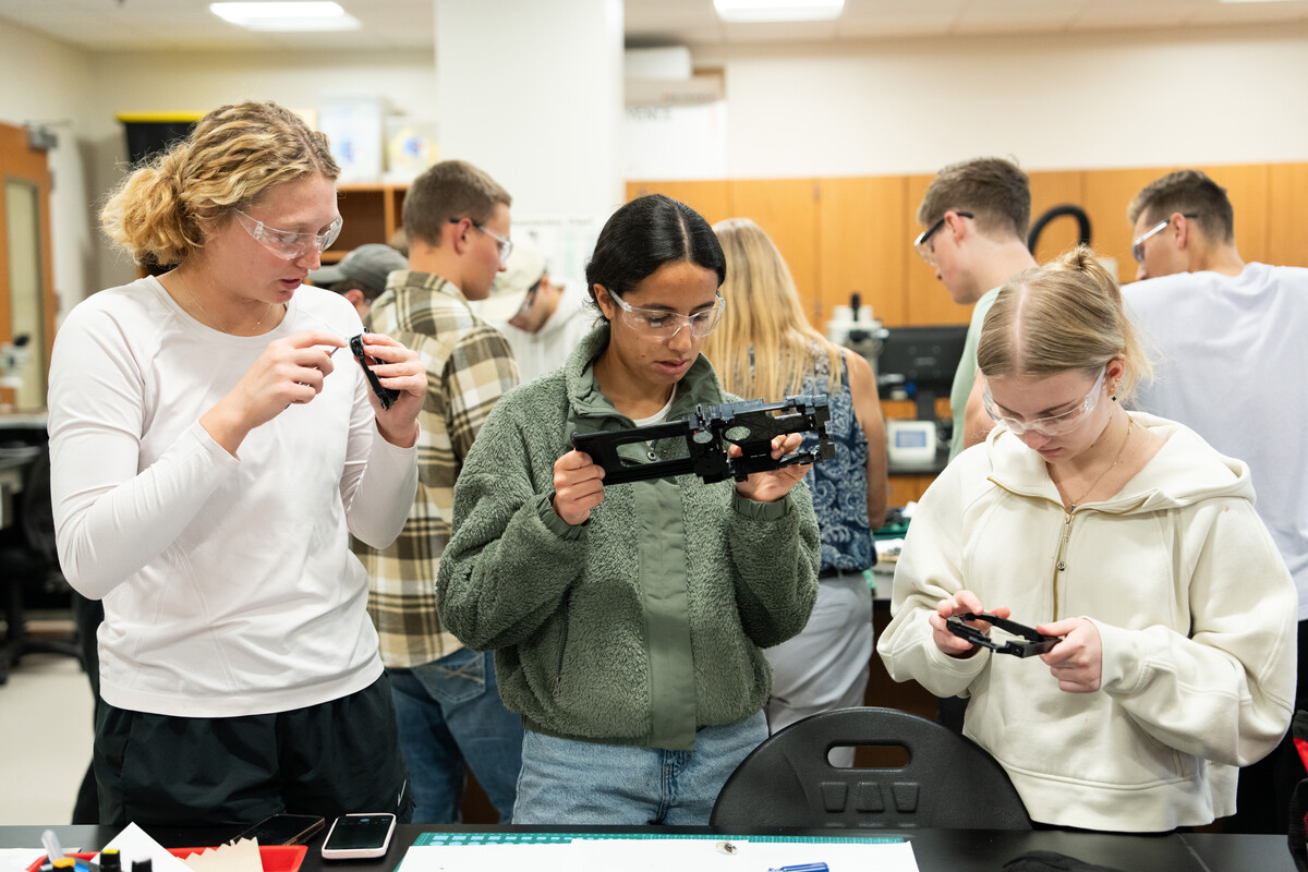 Engineering students and faculty engage in hands-on learning in the St. Thomas Materials Lab.