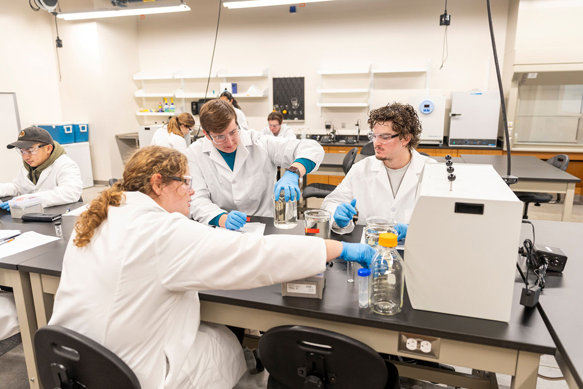 Engineering students and faculty engage in hands-on learning and research in the St. Thomas Water Lab.