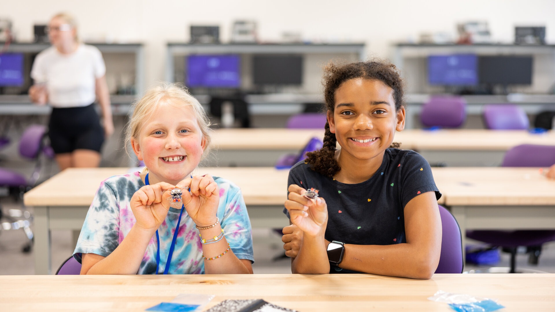 Participants in a Science, Technology and Engineering Preview Summer showcase their projects.