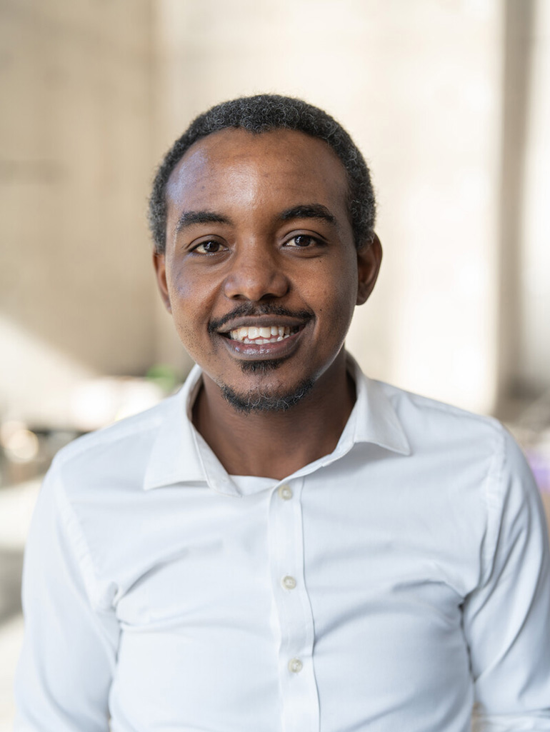 St. Thomas graduate student Brian Osende smiles.