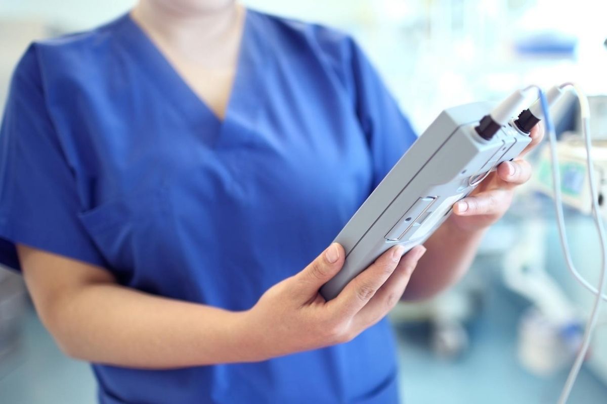 a worker using a medical device