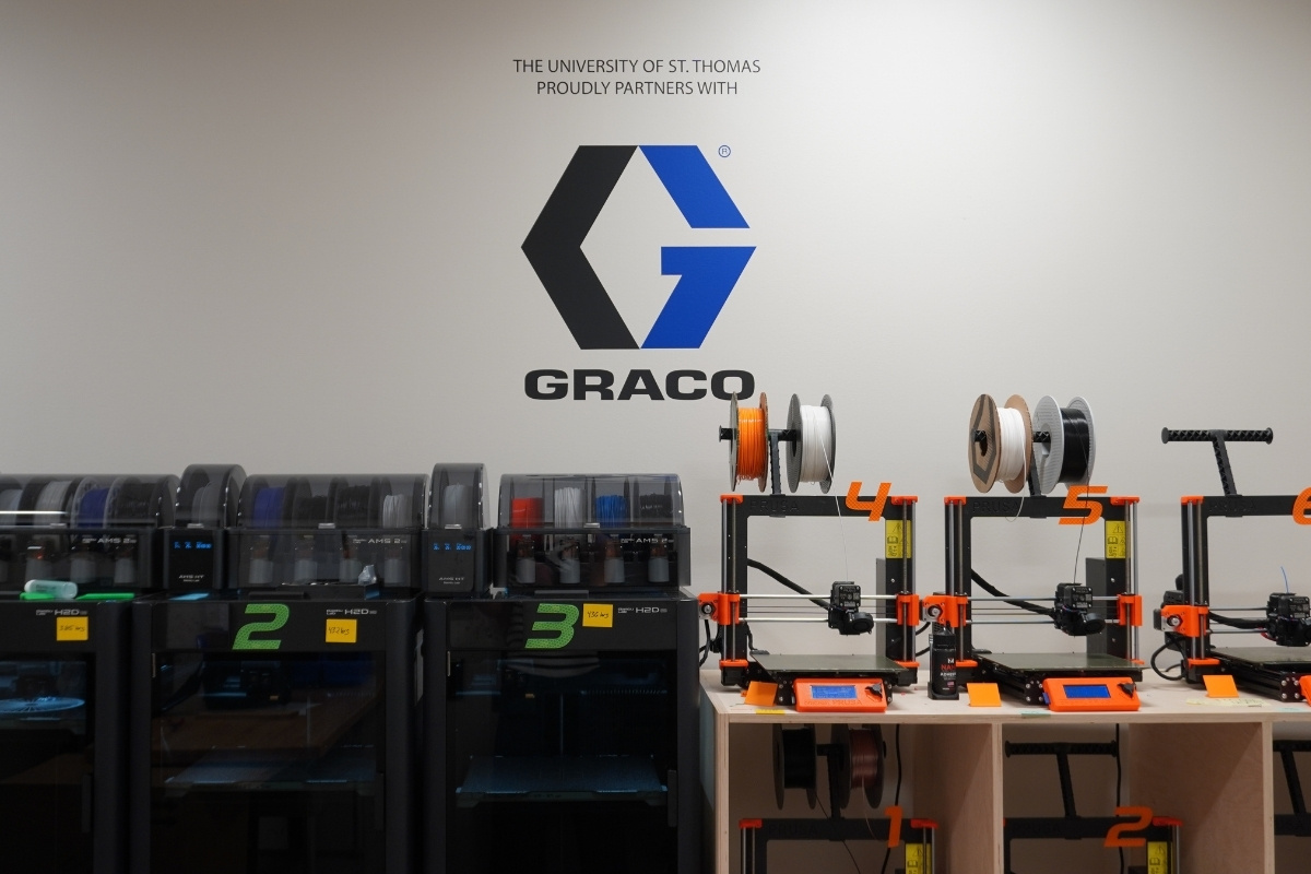Graco partnership decal on the wall of the St. Thomas rapid prototyping wall
