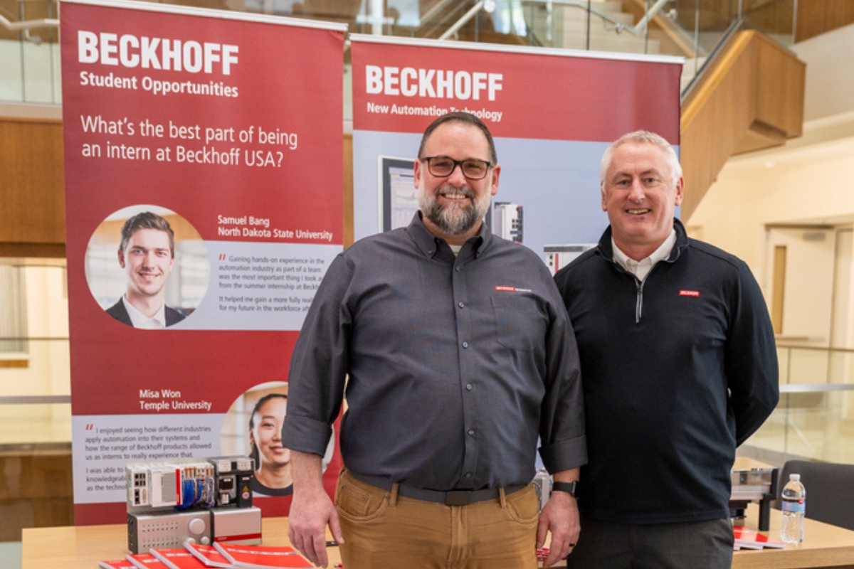 Two employees from Beckhoff Engineering table at the College of Engineering