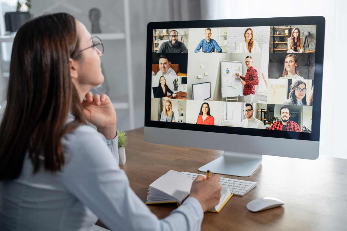 Women attends an online information session.