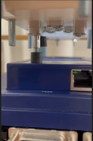 Figure 1: Actuator pressing button on controller